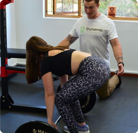 A chiropractitioner displaying Corrective Exercises